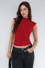 Red sleeveless mock neck crop top with ruffles, machine wash cold