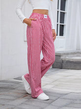 Red and white gingham check plaid wide leg casual pants with elastic waistband and wide leg design