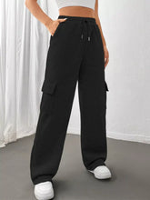 Black relaxed fit wide-leg cargo pants with drawstring waist and side pockets for casual comfort