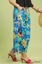 Umgee floral print wide leg pants in blue with frayed hem and side pockets perfect for casual wear
