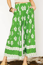 Green umgee floral pleated wide-leg pants with elastic waistband white floral pattern lace trim hem machine wash tumble dry