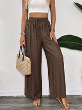 Brown high-waisted casual wide-leg pants with drawstring waistband suitable for comfortable wear and easy care instructions