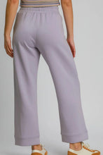 Lavender umgee drawstring elastic waist wide leg pants with fits waist elastic waistband and ribbed cuffs for comfort