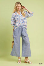 Umgee linen blend striped wide leg pants in blue and white with a drawstring waist for comfortable casual wear