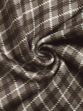 Brown and white plaid high-waisted wide leg pants with soft shiny fabric material composition and care instructions
