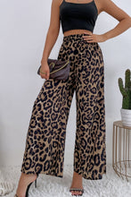 Leopard high waist wide leg pants in flowing lightweight fabric with bold black and tan leopard print pattern