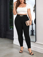 Black plus size elegant high waist skinny trousers featuring a gold chain belt detail for a sophisticated look