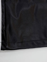 Black satin wide-leg pants with a subtle sheen and crisp white stripe along the edge suitable for tumble dry