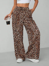Leopard print wide leg pants in soft flowing fabric with brown and beige tones for stylish comfort