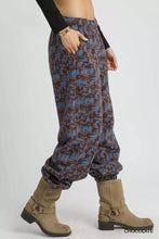 Umgee scenic print casual sweatpants with brown and blue scenic print and relaxed flowing harem silhouette