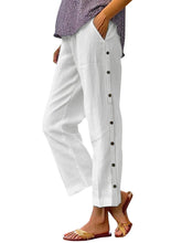 White linen full size casual wide leg trousers with button decor detail on the side seam