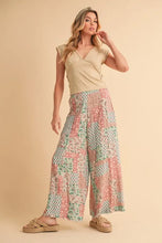 Aemi+Co printed wide leg pants in pastel patchwork with pink mint green and cream floral patterns