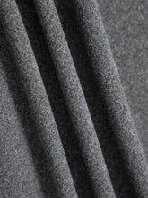 Soft heathered gray woolen relaxed fit drawstring pants with textured slightly fuzzy fabric for comfortable wear