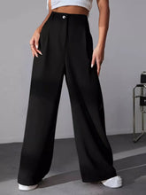 Black wide leg pleated pants with a high waist, sleek tailored fit, and single front button closure for formal wear