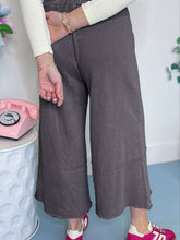 Gray flower patch mineral washed terry knit wide-leg pants with relaxed fit and subtle stitching details