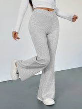 Gray heathered high waisted flare leg pants in soft stretchy fabric offering comfortable stylish wear