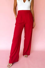 Red pleated detail pull on high elastic waist loose straight pants with wide-leg flowing fabric and subtle waist pleats