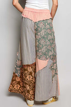 Pink patchwork wide-leg pants with striped floral patterns partial elastic ruffled waistband and side big star patch
