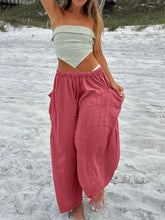 Rustic coral-colored linen full size wide leg pants with drawstring waist and side pockets plus size wide leg pants
