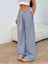 Blue and white drawstring striped wide leg pants with a comfortable drawstring waistband for casual wear