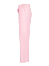 Soft pink tied wide leg pants with elastic waistband and matching drawstring for comfortable wear