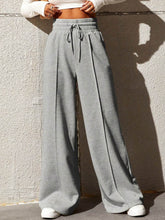 Gray wide leg drawstring waist sweatpants with elastic waistband for comfortable casual wear