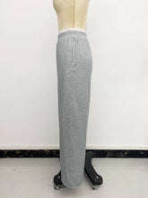 Gray heathered wide leg casual pants with lace trim at the waistband displayed on a mannequin