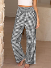 Black and white gingham high waist wide leg pants with elasticated waistband for comfortable stylish wear