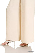Sand beige wide-leg trousers with crinkled texture featuring zenana woven airflow elastic waistband pants design