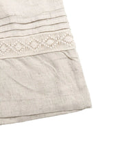Off-white linen casual drawstring wide leg pants with delicate embroidered floral patterns along the hem