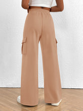 Beige casual high waist cargo pants with wide-leg design elastic waistband and side pockets for comfortable wear