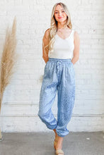 Light blue satin leopard print joggers in cotton with elastic waistband and drawstring for comfortable wear machine wash cold