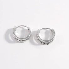 Pair of 925 sterling silver huggie earrings with double-banded silver hoops