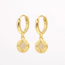 Gold-plated sterling silver hoop earrings with zircon starburst disc