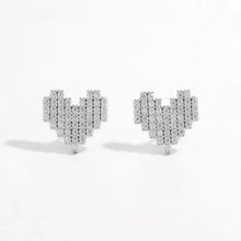 Pair of 925 sterling silver heart stud earrings with pixelated zircon gems