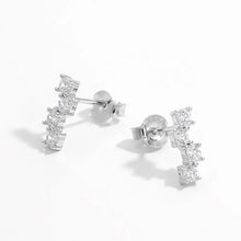 Pair of 925 sterling silver stud earrings with five square-cut zircon stones