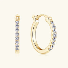 Sterling silver moissanite huggie earrings with gold-toned diamond hoops