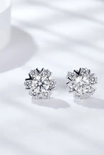 Sterling silver moissanite stud earrings with snowflake design