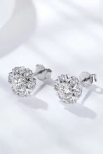 Pair of 925 sterling silver moissanite stud earrings with diamond cluster design