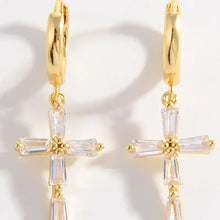 Two sterling silver zircon cross earrings with gold hoops and jeweled pendants