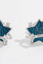 Sterling silver star earrings with teal enamel and zircon gems