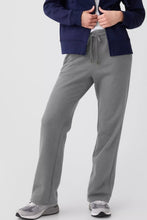 Gray drawstring loose fit pants with a relaxed fit and waistband ideal for casual wear and comfort