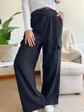 Black corduroy high-waisted wide-leg pants with cargo pockets and matching belt machine wash tumble dry safe