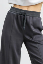 Umgee dark gray soft-textured wide leg cropped pants with drawstring waistband and subtle side seam detailing