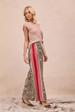 BiBi leopard print pants with leopard print wide-leg design and bold red and white vertical side stripes and welt pockets