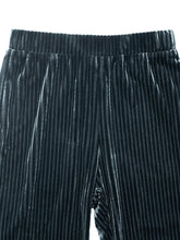 Black high-waisted ribbed velvet flare pants with vertical stripes and a ribbed waistband for a luxurious velvet look