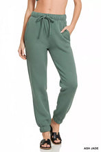 Ash jade fleece drawstring joggers from zenana made of soft stretchy fabric with waistband and elastic cuffs