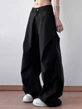 Black wide leg oversized pants with sleek modern design and subtle stitching details care instructions included