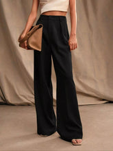 Black high-waisted wide-leg pants with a sleek tailored fit ideal for formal and casual wear