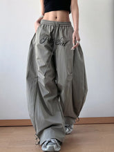 Gray drawstring oversized wide leg casual pants with loose fit and pretty girl embroidered in black script on thigh